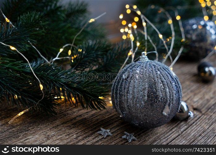 Elegant gray silver christmas close up scene on natural wood background. Elegant gray christmas
