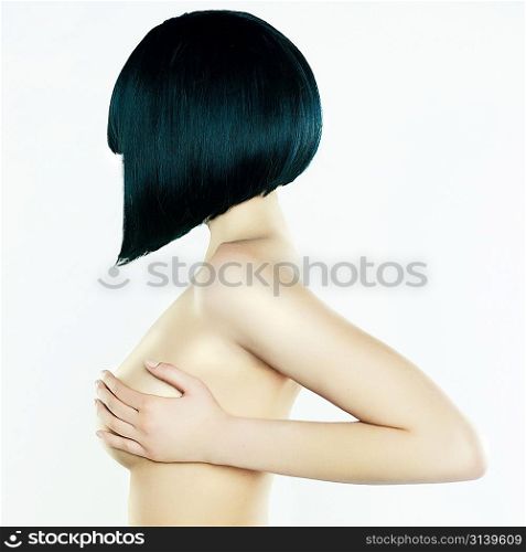 Elegant nude woman with short stylish hairstyle
