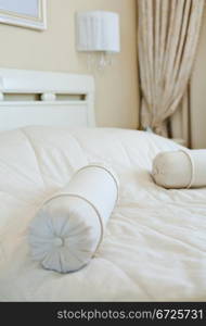 Elegant pillows on bed