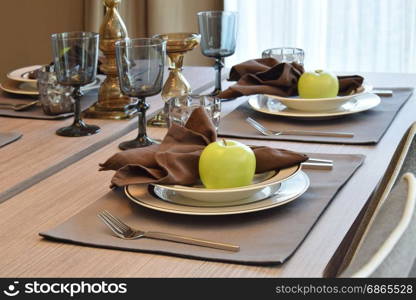 elegant table set in modern style dining room interior