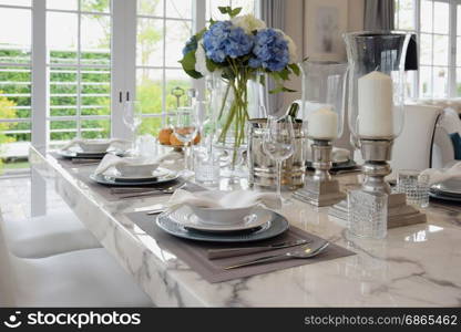 elegant table set in vintage style dining room interior