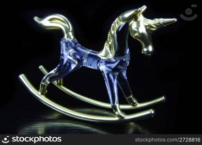 Elegant unicorn of crystal with blue tone and I pray with a black bottom