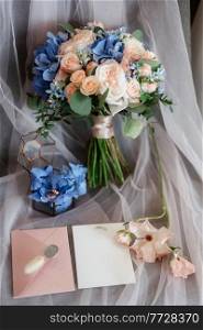 elegant wedding bouquet of fresh natural flowers and greenery