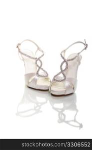 Elegant wedding shoes over white background
