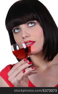 elegant woman drinking wine