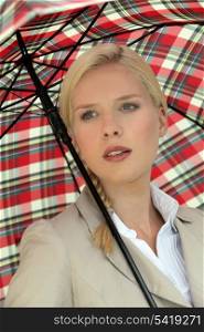 elegant woman holding an umbrella