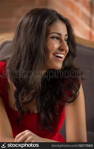 Elegant woman in a coffee break at cafe in loft style