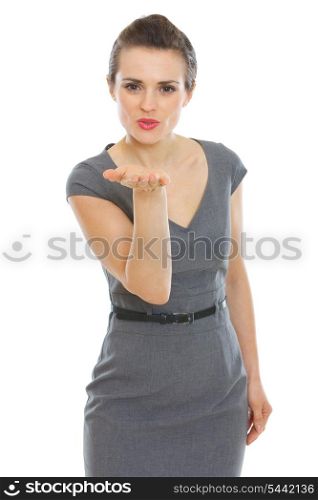 Elegant woman in dress blowing air kiss