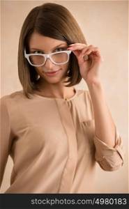 Elegant woman in glasses