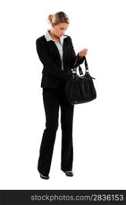 elegant woman in suit with bag