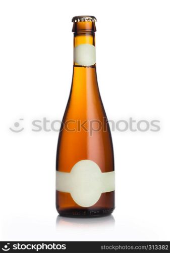 Elegnat slim bottle of lager craft beer with label on white background
