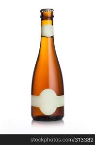 Elegnat slim bottle of lager craft beer with label on white background