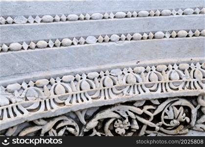 Element of marble frieze, antique ruins. Turkey, Side.