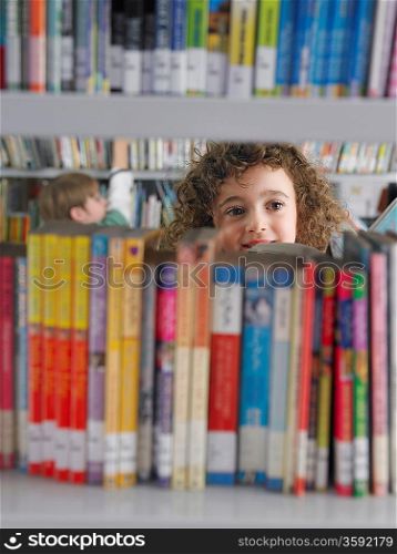Elementary Student Reading in Library