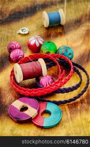 Elements for making jewelry from beads and leather straps. Colorful beads for bracelet