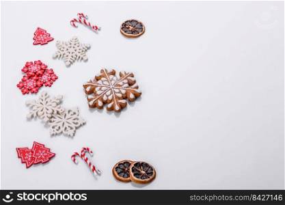 Elements of Christmas scenery, toys, gingerbread and other Christmas tree decorations on a white background. Preparing for the holiday. Elements of Christmas scenery, toys, gingerbread and other Christmas tree decorations