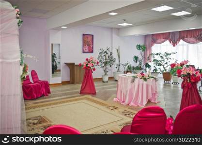 Elements of decorating the room for the ceremony.. The hall is decorated for the ceremony 465.