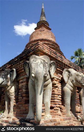 Elephants and the corner of pagoda in old Sukhotai, Thailand
