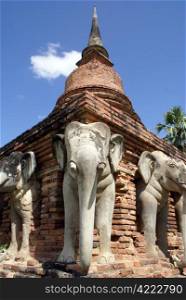 Elephants and the corner of pagoda in old Sukhotai, Thailand