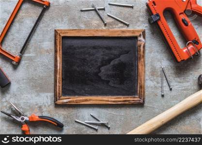 elevated view blank slate surrounded by various worktools