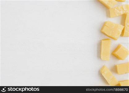 elevated view cheddar cheese slices white background. Resolution and high quality beautiful photo. elevated view cheddar cheese slices white background. High quality beautiful photo concept