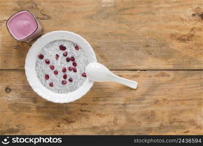 elevated view chia seed pudding white bowl with smoothie table