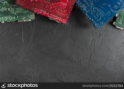 elevated view colorful computer circuit boards black backdrop