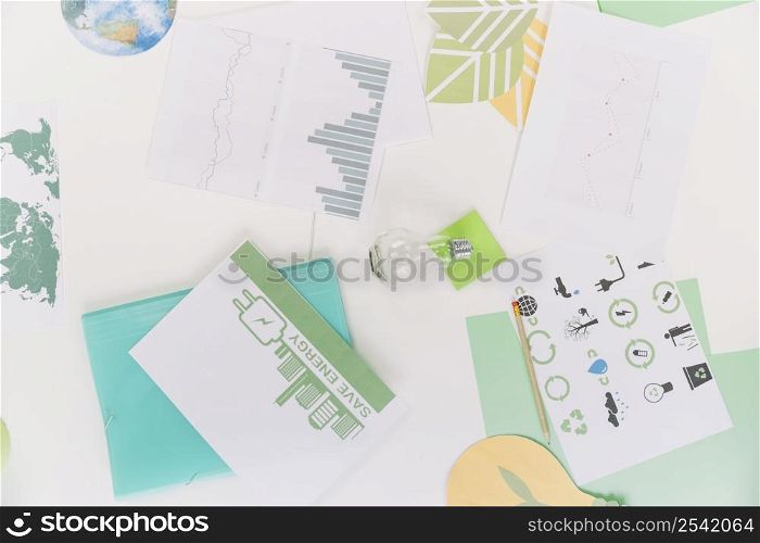 elevated view graph with natural resources icon desk