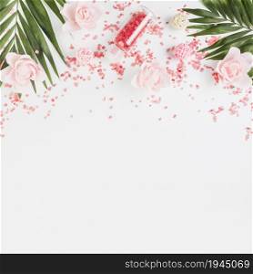 elevated view himalayan salt leaves flowers white backdrop. High resolution photo. elevated view himalayan salt leaves flowers white backdrop. High quality photo