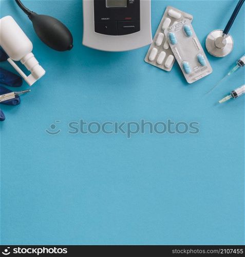 elevated view medical equipments blue background