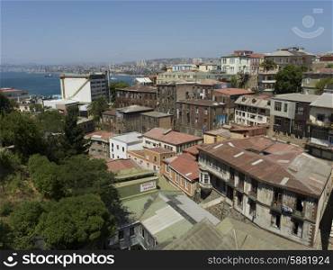 Elevated view of buildings and ocean inlet, Valparaiso, Chile