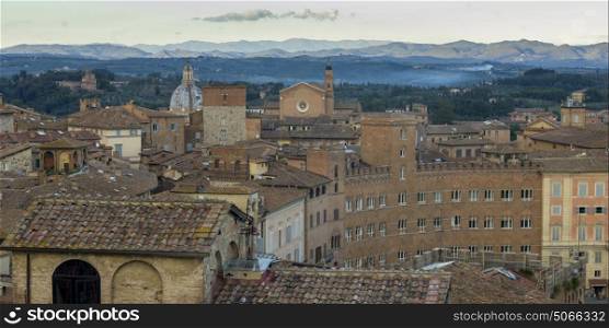 Elevated view of buildings in city, Siena, Tuscany, Italy