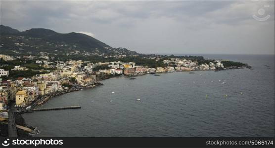 Elevated view of coastal city from Aragonese Castle, Ischia Island, Campania, Italy