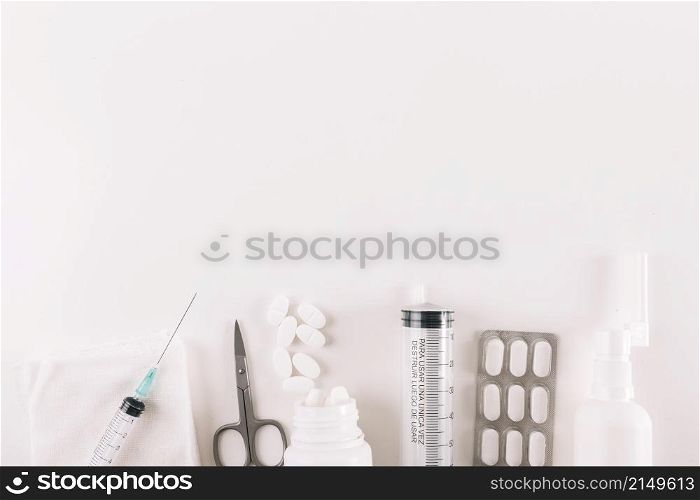 elevated view pills medical equipments white background