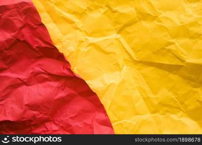 elevated view two red yellow crumpled papers 2. Resolution and high quality beautiful photo. elevated view two red yellow crumpled papers 2. High quality beautiful photo concept