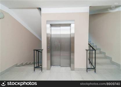 Elevator and stairs up and down in a modern elegant building. Elevator and stairs