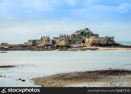 Elizabeth Castle in a low tide waters, Saint Helier, bailiwick of Jersey, Channel Islands