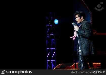 Elvis Presley impersonater performing in Branson, Missouri, U.S.A.