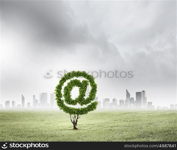 Email concept. Image of plant shaped like at symbol