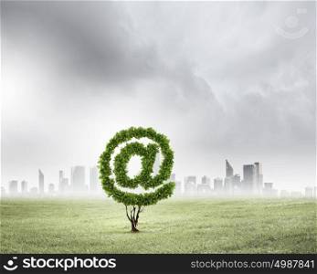 Email concept. Image of plant shaped like at symbol