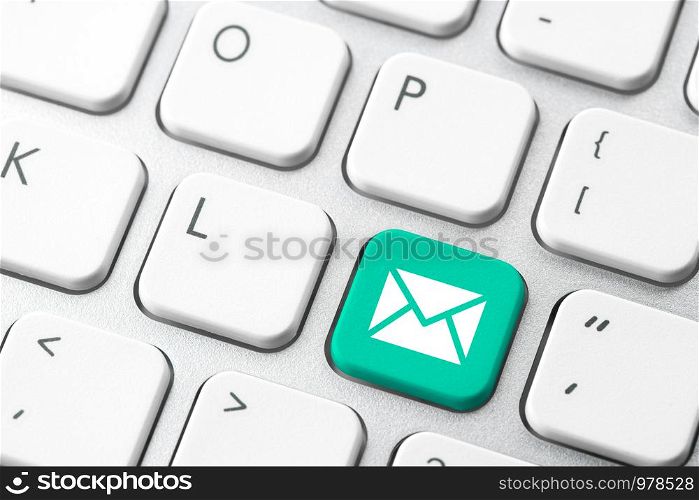 Email & contact us icon on computer keyboard