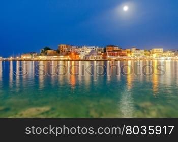Embankment and the mosque Kucuk Hasan Pasha in night light. Chania. Crete. Greece.. Chania. The old harbor at night.