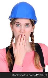 Embarrassed female builder