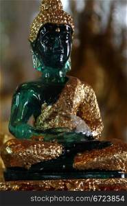 Emerald glass Buddha in temple, wat Hualampong, Bangkok, Thailand
