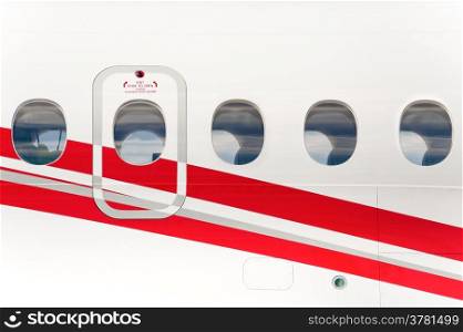 emergency exit doorway on the fuselage of a passenger aircraft