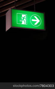 Emergency exit sign in modern offices inside an industrial plant