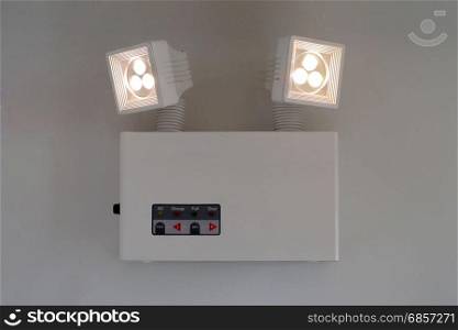 emergency lighting with turn on light bulbs on the wall