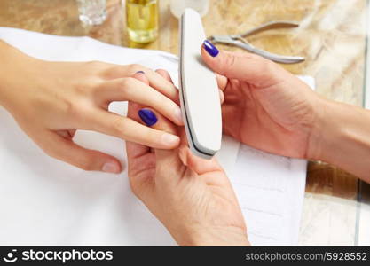 emery polish sandpaper woman nails in Nail Salon