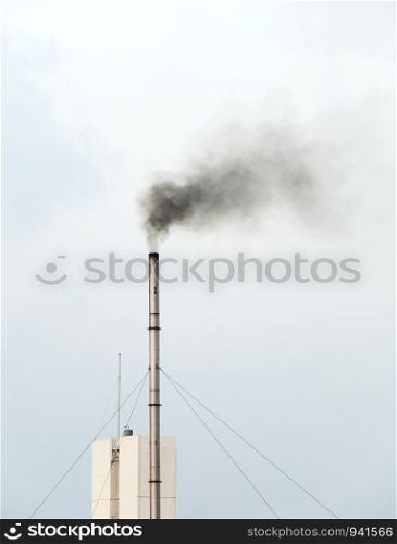 Emissions from the old smokestacks of industrial plants.