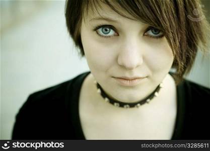 emo or goth young woman, natural soft light,selective focus on eye